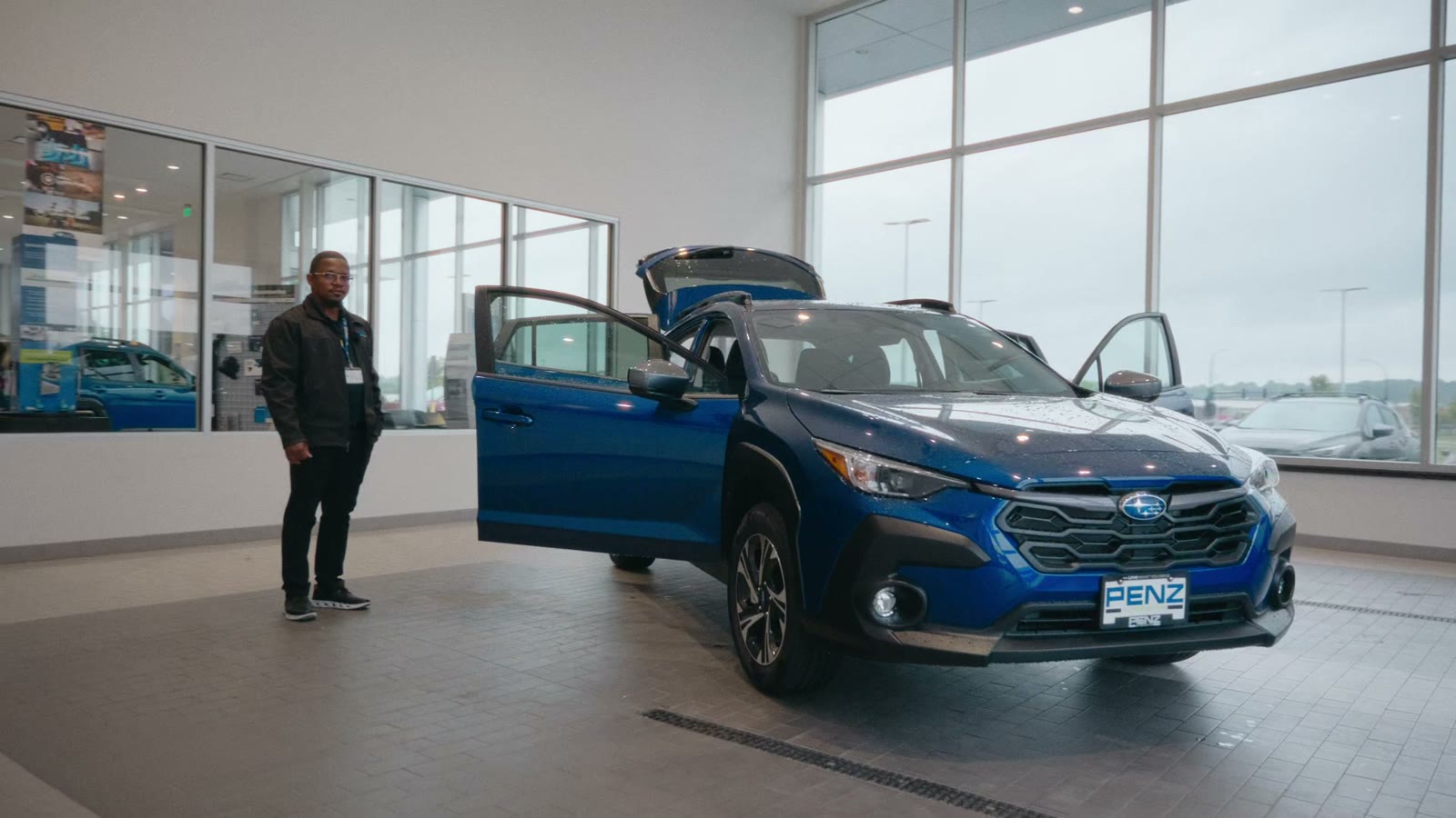 2026 Subaru Crosstrek Premium in Sapphire Blue on the Subaru of Rochester showroom floor, video thumbnail